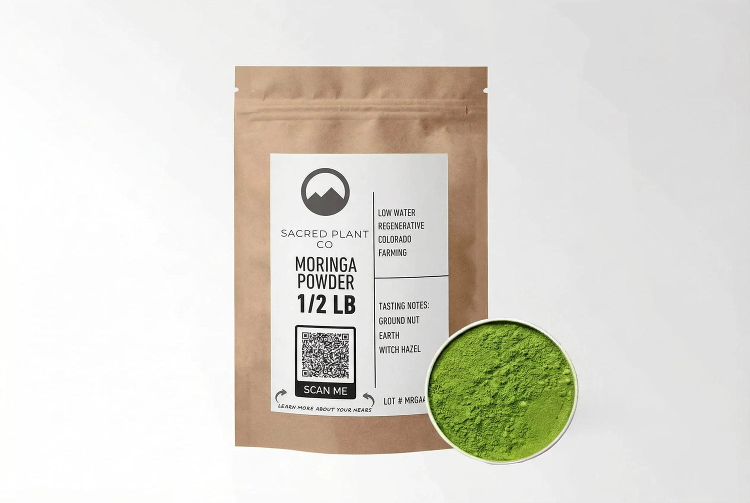 Sacred Plant Co Moringa Powder 1/2 lb pouch listing low water regenerative Colorado farming, displayed next to a small bowl of vibrant green raw moringa powder to show fine texture.