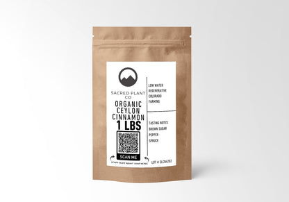 Image of a 1-pound bag of Sacred Plant Co Organic Ceylon Cinnamon. The kraft paper packaging has a white label with the company logo, a description of the product, 