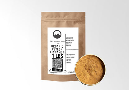Image of a 1-pound bag of Sacred Plant Co Organic Ceylon Cinnamon next to an open circular container filled with ground cinnamon.
