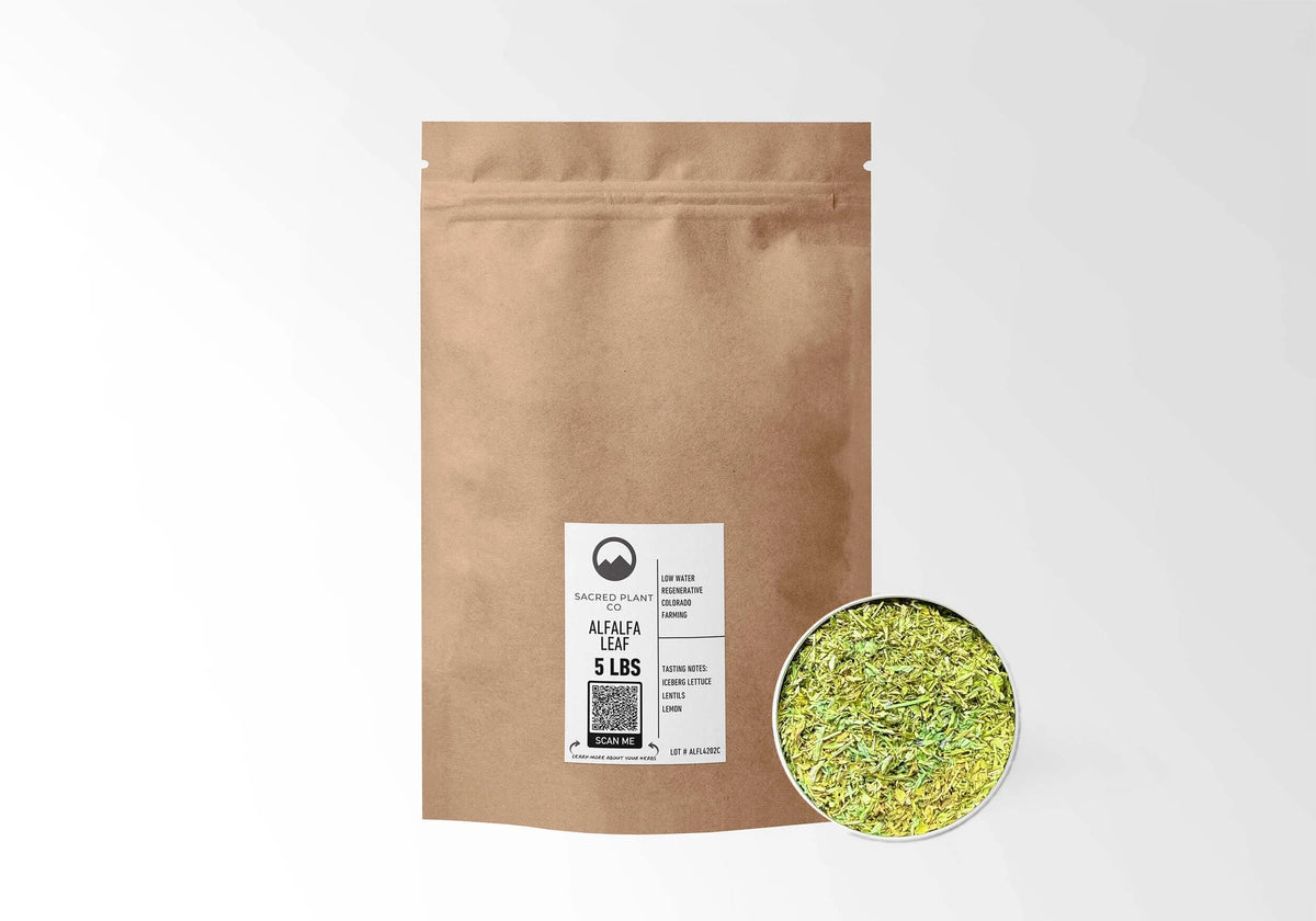 Sacred Plant Co Alfalfa Leaf 5 LBS kraft stand-up pouch shown with a sample of the herb.