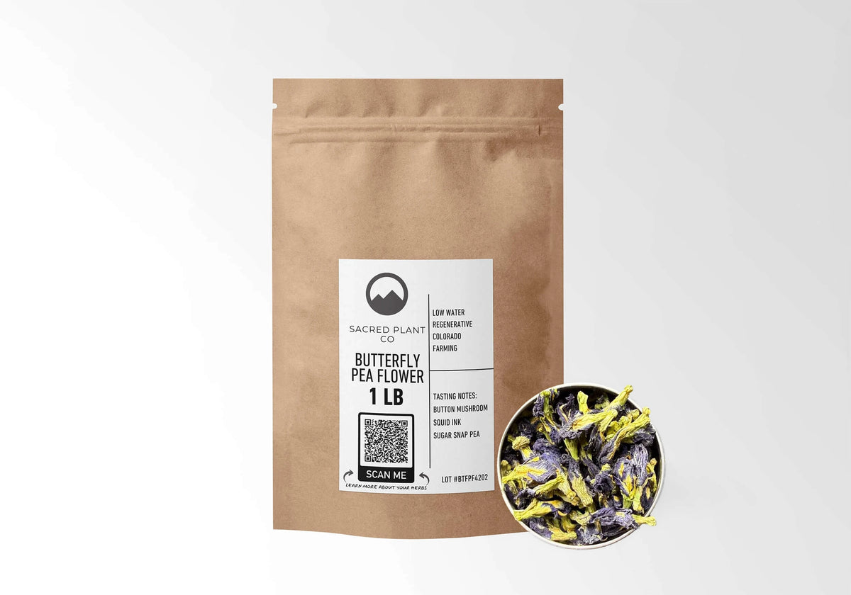 Sacred Plant Co Butterfly Pea Flower 1 LB kraft stand-up pouch shown with a sample of the flowers.