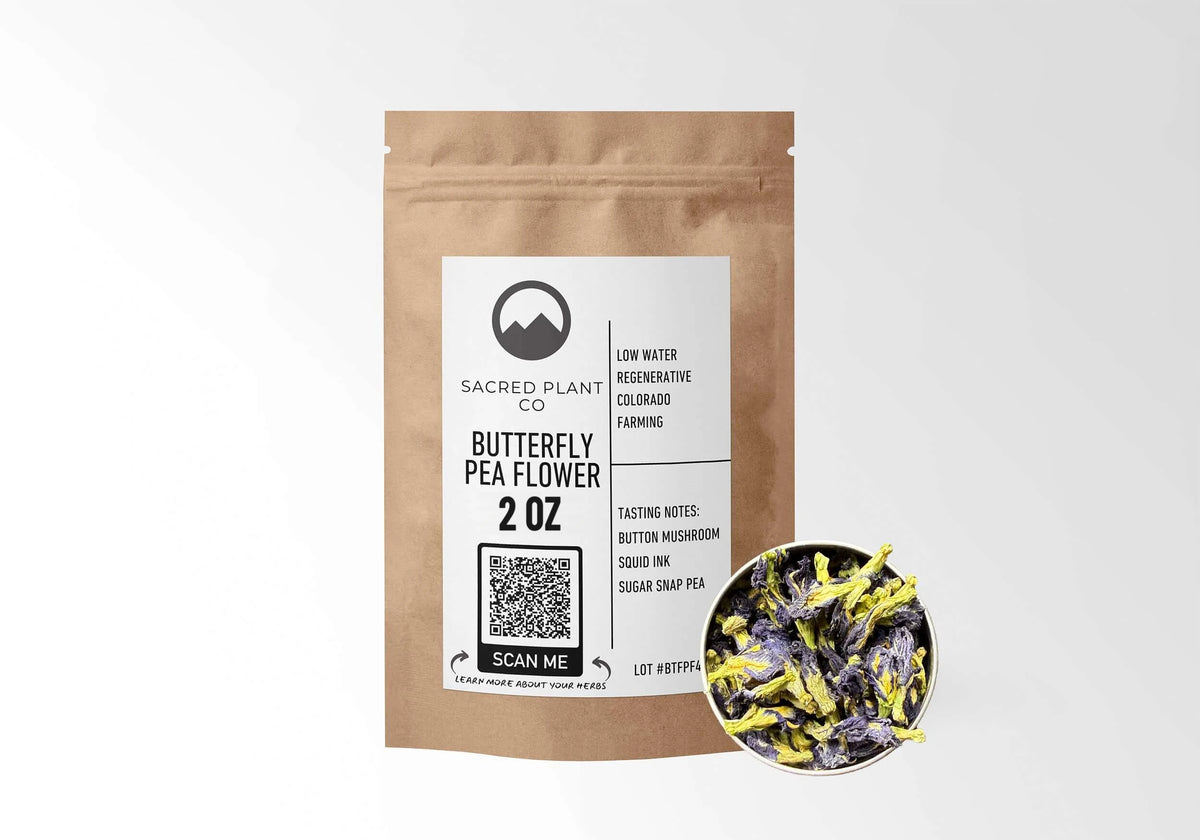 Sacred Plant Co Butterfly Pea Flower 2 oz in a kraft stand-up pouch with a sample in a silver tin.