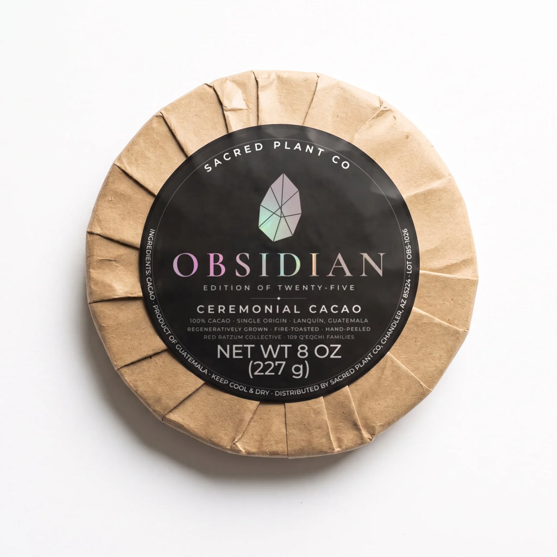 Sacred Plant Co Obsidian Edition ceremonial cacao round, 8 oz of 100% Guatemalan cacao, kraft-wrapped with a black holographic label