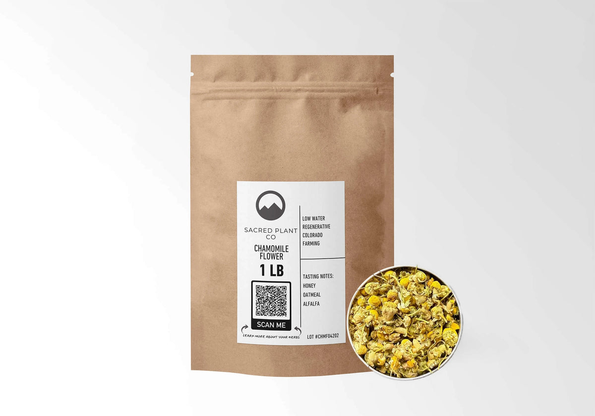 Sacred Plant Co Chamomile 1 LB kraft stand-up pouch shown with a sample of the herb.