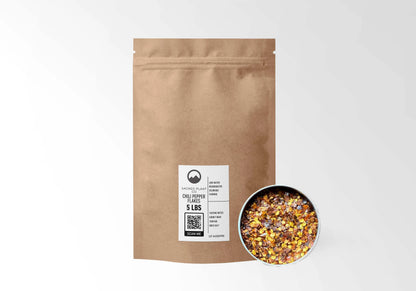 Sacred Plant Co Chili Pepper Flakes 5 LBS kraft stand-up pouch shown with a sample of the flakes.