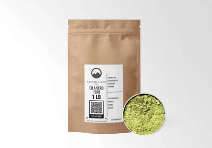 Sacred Plant Co Cilantro Leaf 1 LB kraft stand-up pouch shown with a sample of the herb.