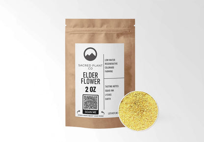 Sacred Plant Co Elder Flowers 2 oz in a kraft stand-up pouch with a sample in a silver tin.