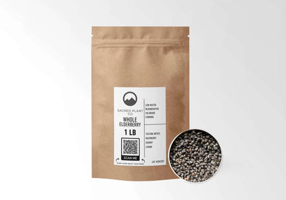 Sacred Plant Co Elderberries 1 LB kraft stand-up pouch shown with a sample of the berries.