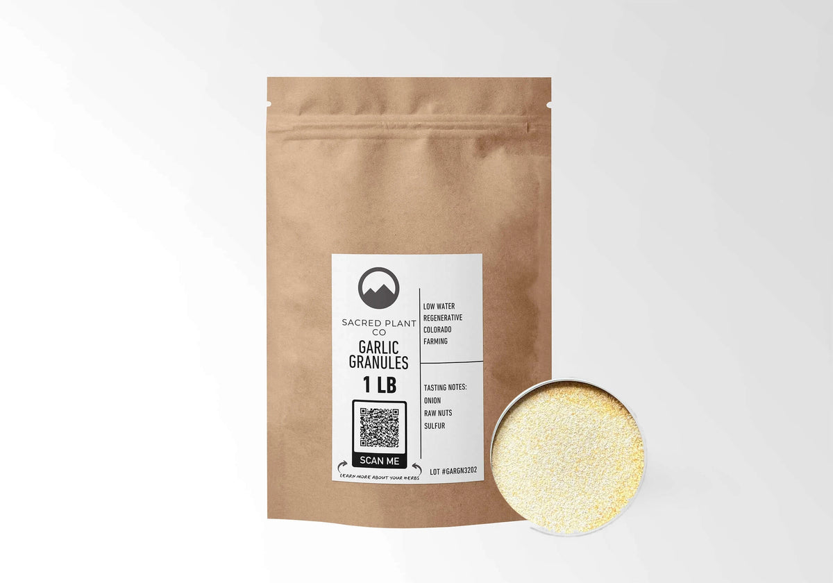 Sacred Plant Co Garlic Granules 1 LB kraft stand-up pouch shown with a sample of the granules.