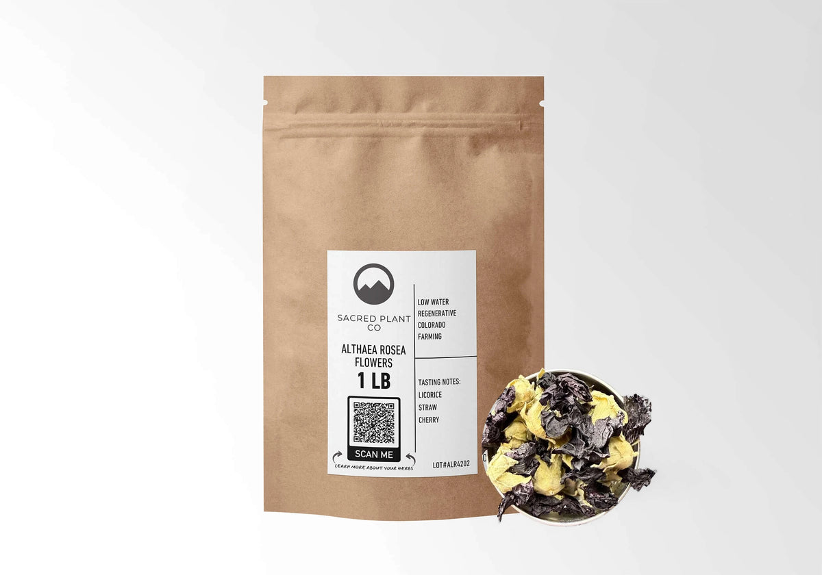 Sacred Plant Co Hollyhock Flowers 1 LB kraft stand-up pouch shown with a sample of the flowers.