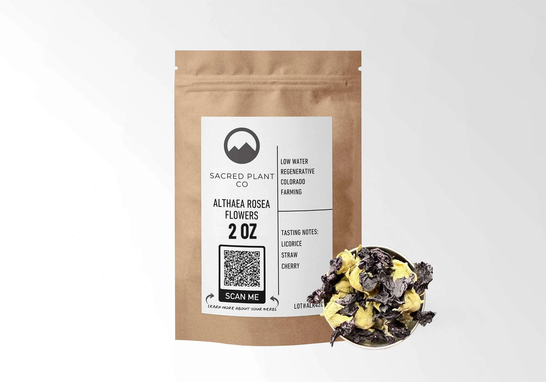 Sacred Plant Co Hollyhock Flowers 2 oz in a kraft stand-up pouch with a sample in a silver tin.