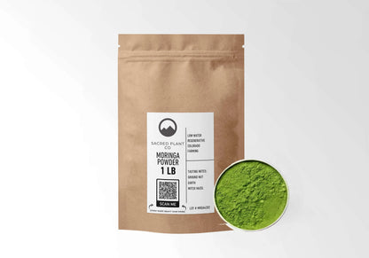 Sacred Plant Co Moringa Powder 1 LB kraft stand-up pouch shown with a sample of the powder.