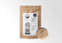Sacred Plant Co Organic Cacao Powder 1/2 LB in a kraft stand-up pouch with the holographic organic seal on the label and a sample in a silver tin.