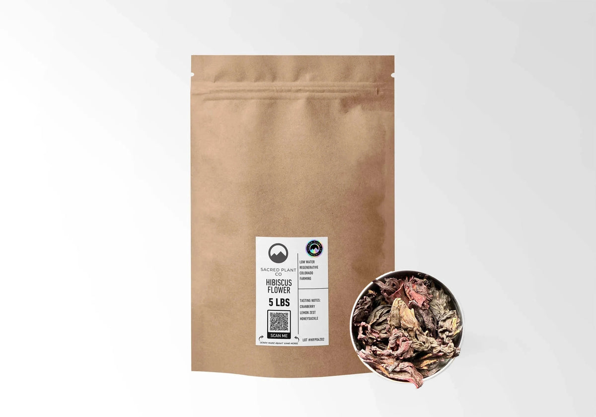 Sacred Plant Co Organic Hibiscus Flowers 5 LBS kraft stand-up pouch shown with a sample of the herb.