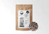 Sacred Plant Co Organic Juniper Berries 1/2 LB in a kraft stand-up pouch with the holographic organic seal on the label and a sample of whole dried juniper berries in a silver tin.