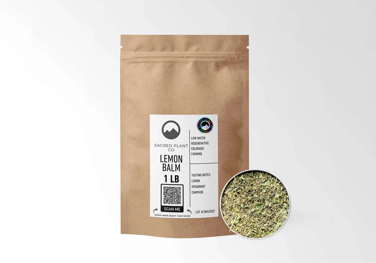 Sacred Plant Co Organic Lemon Balm 1 LB kraft stand-up pouch shown with a sample of the herb.