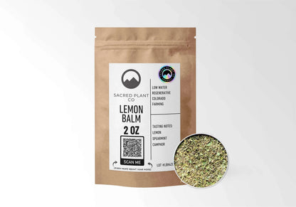 Sacred Plant Co Organic Lemon Balm 2 oz kraft stand-up pouch shown with a sample of the herb.
