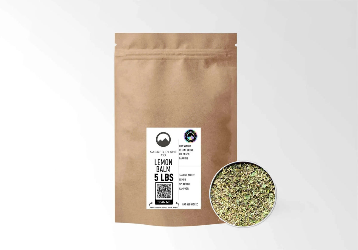 Sacred Plant Co Organic Lemon Balm 5 LBS kraft stand-up pouch shown with a sample of the herb.