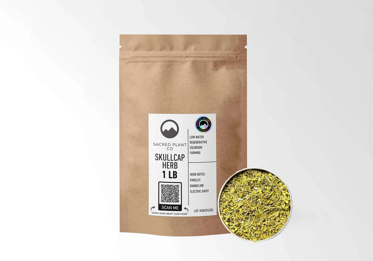Sacred Plant Co Organic Skullcap 1 LB kraft stand-up pouch shown with a sample of the herb.