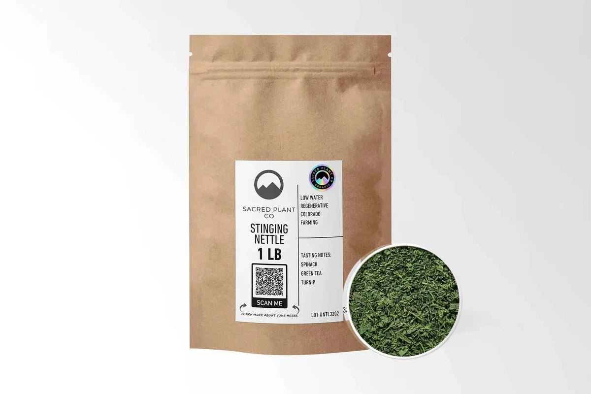 Sacred Plant Co Organic Stinging Nettle Leaf 1 LB kraft stand-up pouch shown with a sample of the herb.