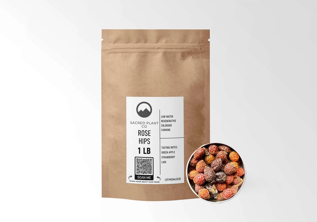 Sacred Plant Co Rose Hips 1 LB kraft stand-up pouch shown with a sample of the herb.
