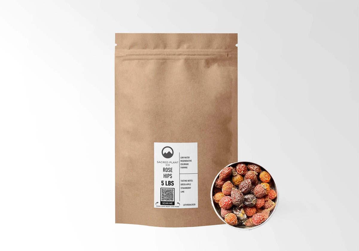 Sacred Plant Co Rose Hips 5 LBS kraft stand-up pouch shown with a sample of the herb.