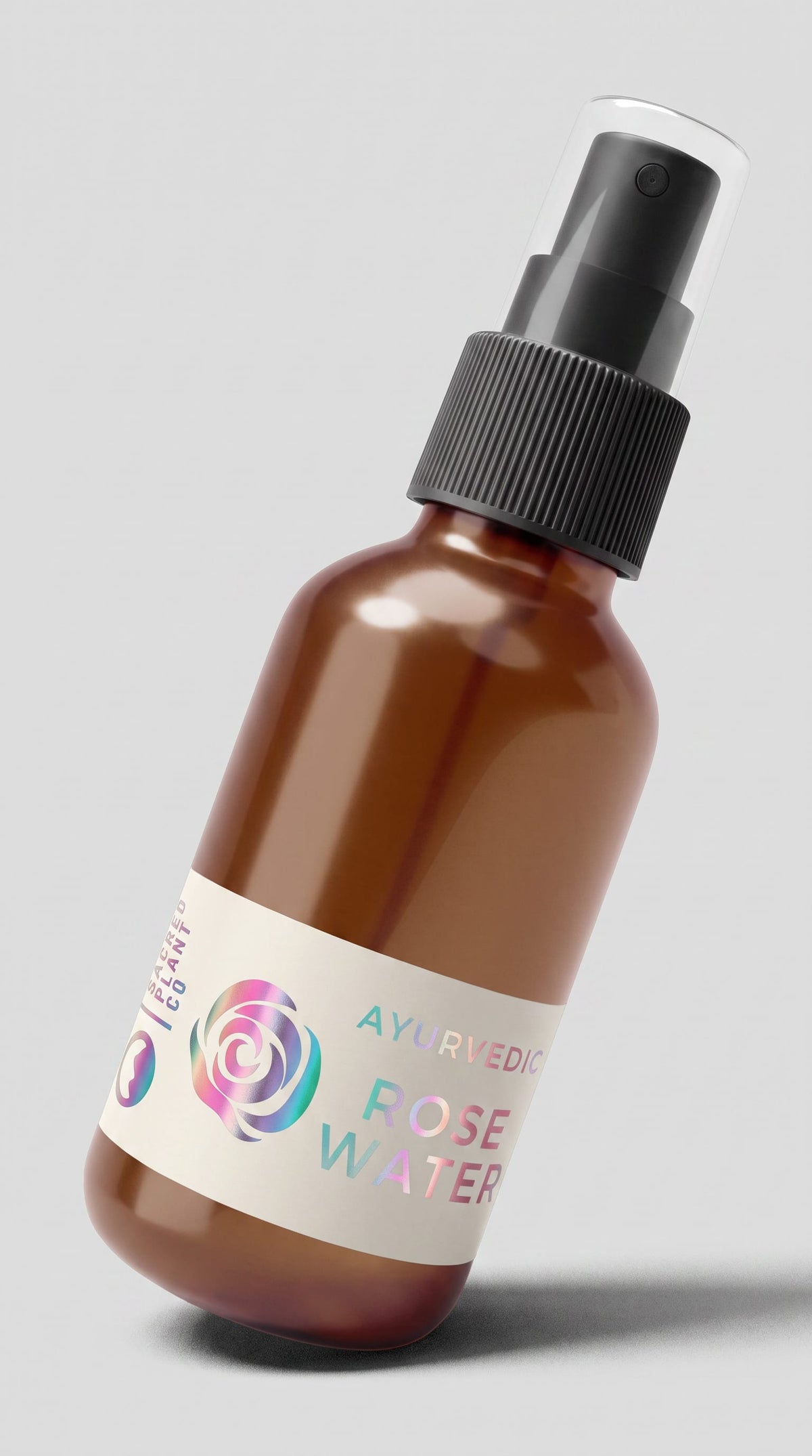 Close-up of the holographic foil rose label on Sacred Plant Co&