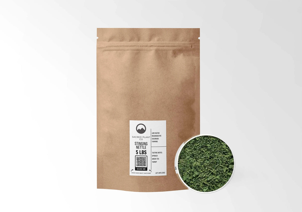 Sacred Plant Co Stinging Nettle Leaf 5 LBS kraft stand-up pouch shown with a sample of the herb.