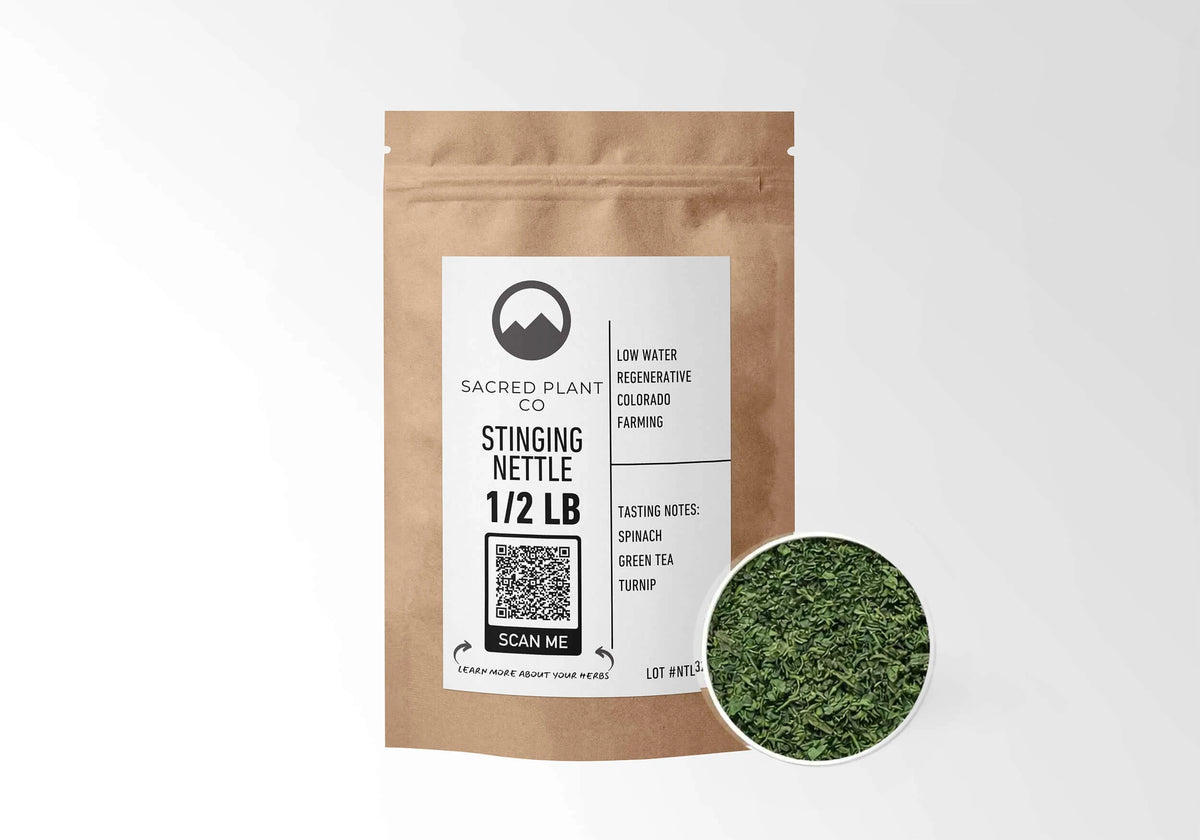 Sacred Plant Co Stinging Nettle Leaf 1/2 LB kraft stand-up pouch shown with a sample of the herb.
