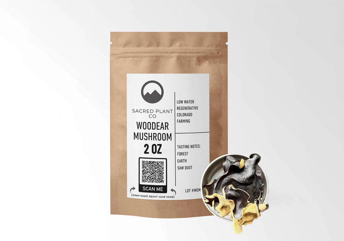 Sacred Plant Co Woodear Mushroom 2 oz in a kraft stand-up pouch with a sample in a silver tin.
