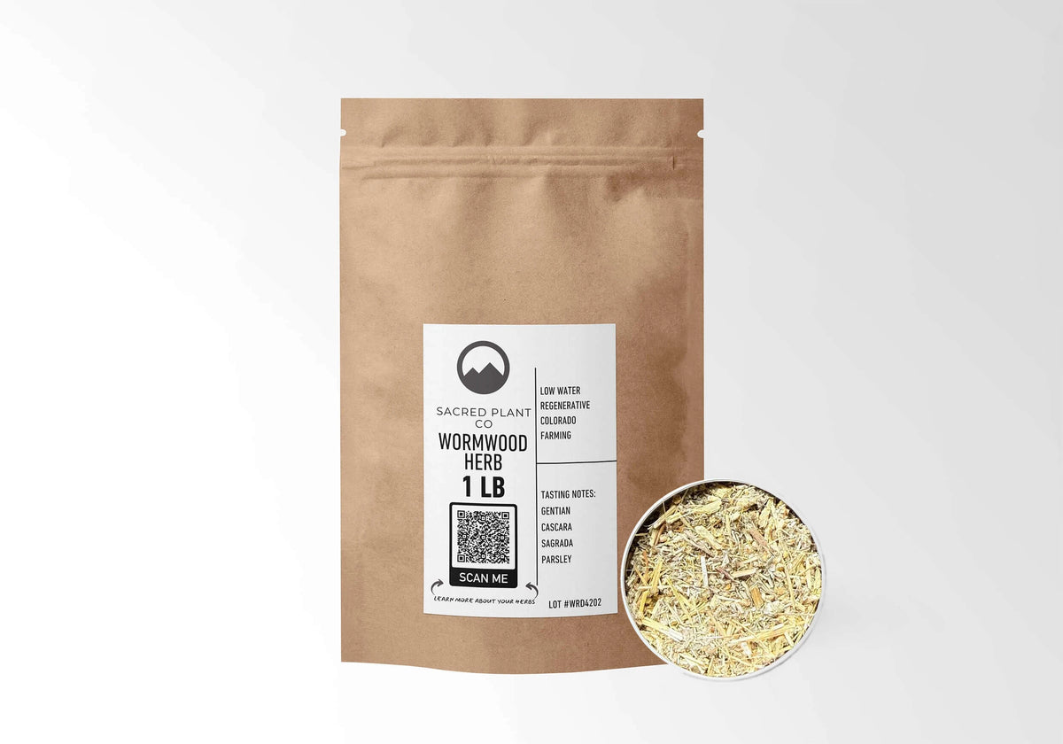 Sacred Plant Co Wormwood 1 LB kraft stand-up pouch shown with a sample of the herb.