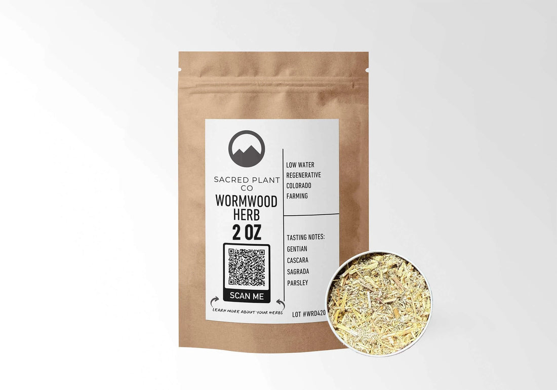 Sacred Plant Co Wormwood 2 oz in a kraft stand-up pouch with a sample in a silver tin.