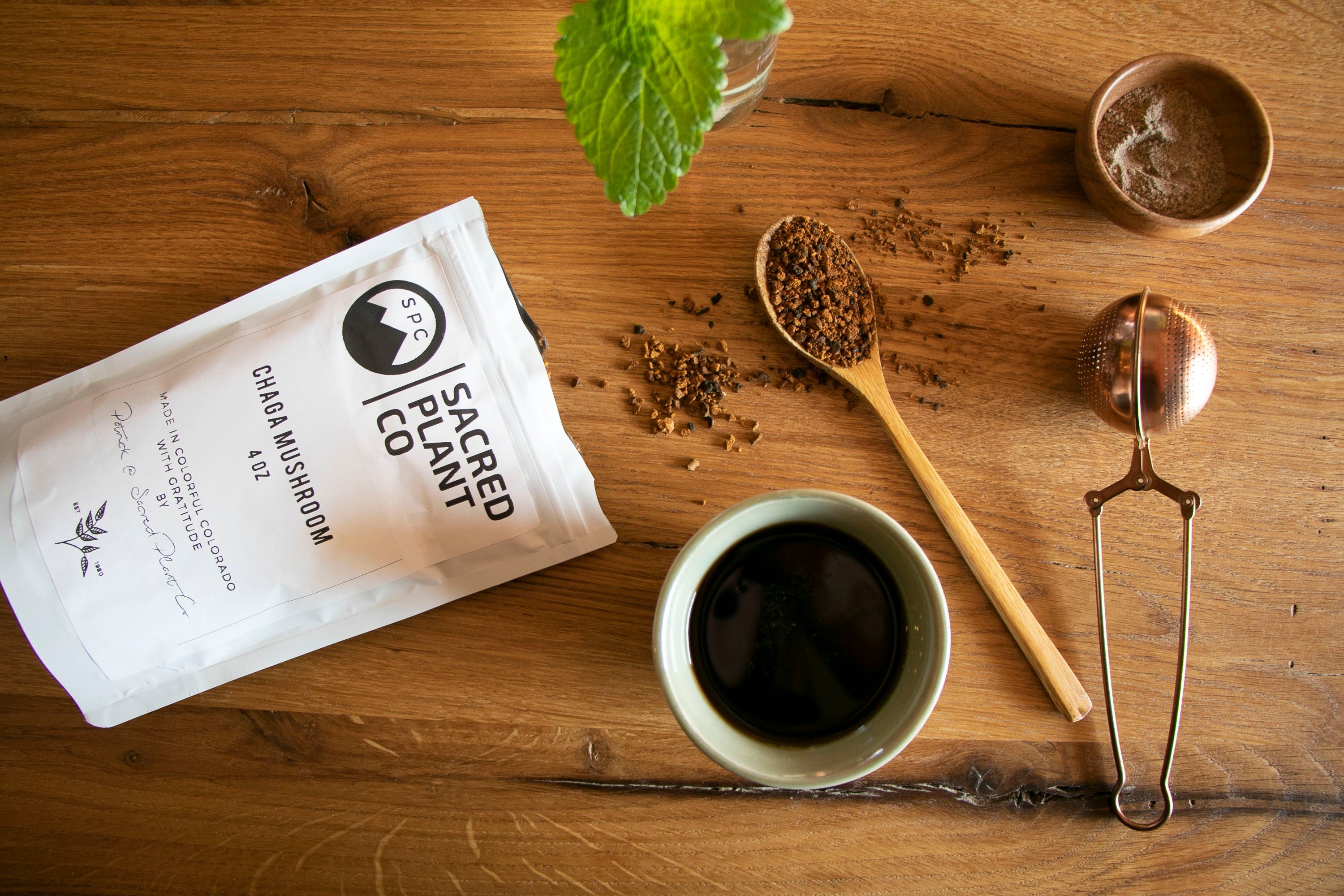 An inviting tea preparation scene with Sacred Plant Co&