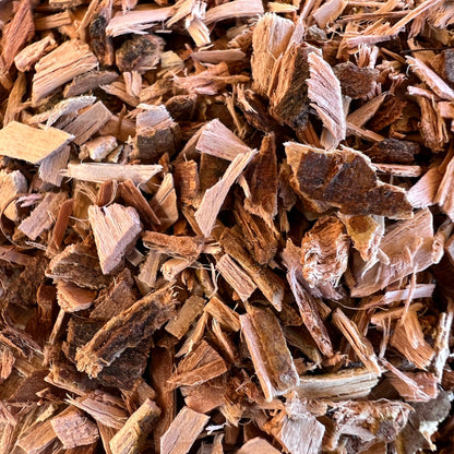 Macro close-up of White Willow Bark shavings, the natural ingredient for pain relief in Sacred Plant Co&